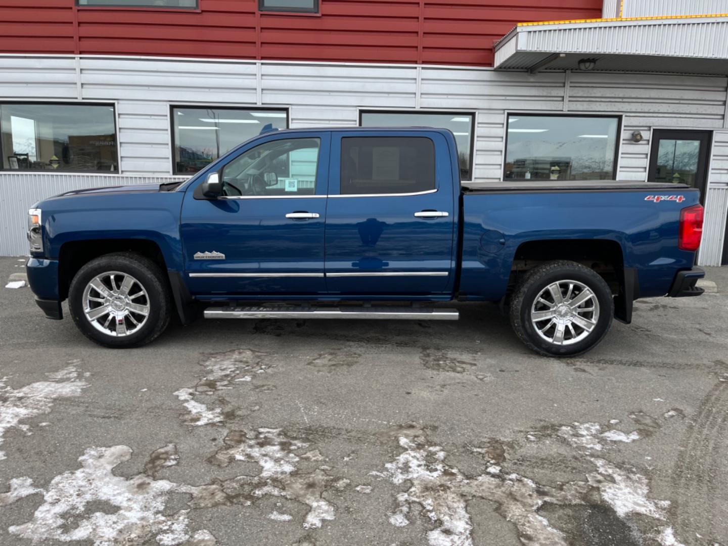 2017 Blue /black leather Chevrolet Silverado 1500 High Country Crew Cab Short Box 4WD (3GCUKTEJ2HG) with an 6.2L V8 OHV 16V engine, 6A transmission, located at 1960 Industrial Drive, Wasilla, 99654, (907) 274-2277, 61.573475, -149.400146 - Photo#1